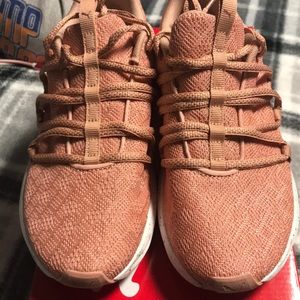 Pink and white pumas